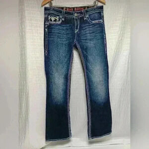 Rock Revival Jenna Boot cut Buckle jeans. Ladies size 29